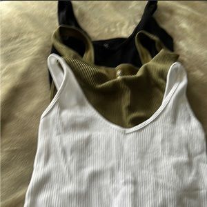 NWOT Set of 3 Aura Bodysuits.